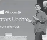  ?? RICHARD DREW/ ASSOCIATED PRESS ARCHIVES ?? In October, Terry Myerson, a Microsoft executive vice president, discussed the impending Windows 10 update in New York. The updates will reach users over time.