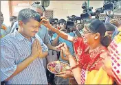  ??  ?? Arvind Kejriwal meets locals at Raja Bazaar during the first day of AAP’s doortodoor campaign on Sunday. SUSHIL KUMAR/HT PHOTO