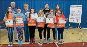  ?? SUBMITTED PHOTO — BERKSHIRE HATHAWAY ?? This year’s winners Build A House … Build A Dream contest are pictured: front row from left: second-place team Maggie and Courtney, first-place team Ally and Grace and thirdplace team Katie and Marley; back row from left: retired planner George Fasic,...