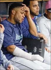  ?? DUANE BURLESON / GETTY IMAGES ?? Robinson Cano, already out with a broken hand, has now been suspended for 80 games after testing positive for a diuretic.