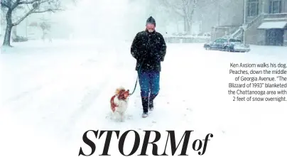  ??  ?? Ken Axsiom walks his dog, Peaches, down the middle of Georgia Avenue. “The Blizzard of 1993” blanketed the Chattanoog­a area with 2 feet of snow overnight.