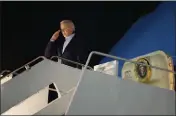  ?? MANUEL BALCE CENETA — THE ASSOCIATED PRESS ?? President Joe Biden salutes as he boards Air Force One at Andrews Air Force Base, Md., on Tuesday.