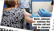  ?? ?? Boris Johnson watches the vaccine roll out in January