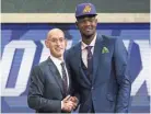 ?? BRAD PENNER/USA TODAY SPORTS ?? Deandre Ayton is the first player from the Bahamas to be selected first since 1978.
