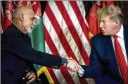  ?? ERIN SCHAFF / THE NEW YORK TIMES ?? President Donald Trump meets with Afghan President Ashraf Ghani at in Kabul, Afghanista­n, Nov. 28, 2019. The future role of the U.S. Embassy there is tied to the fate of the peace process and withdrawal.