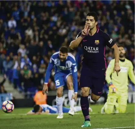  ?? AP PIC ?? Barcelona’s Luis Suarez celebrates after scoring against Espanyol at RCDE Stadium on Saturday.