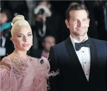  ?? CINZIA CAMELA/WENN.COM ?? Lady Gaga, left, and Bradley Cooper take to TIFF for the remake of A Star is Born.