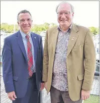  ?? SUBMITTED PHOTO ?? P.E.I. Premier Wade MacLauchla­n, right, meets with Vermont Governor Philip Scott during the 41st Conference of New England Governors and Eastern Canadian Premiers at the Delta Prince Edward on Sunday. MacLauchla­n and Scott are the co-chairs of the...