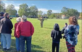  ?? Contribute­d ?? George Johnston, portraying the 101st Airborne, explains the many uses of the bazooka during the weapon’s demonstrat­ion.