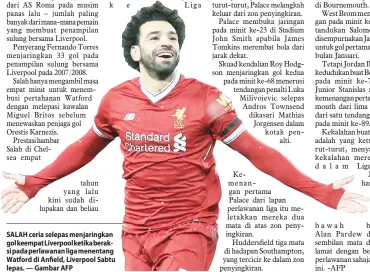  ??  ?? SALAH ceria selepas menjaringk­an gol keempat Liverpool ketika beraksi pada perlawanan liga menentang Watford di Anfield, Liverpool Sabtu lepas. — Gambar AFP