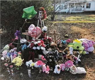  ?? JOSHUA SHARPE / JOSHUA.SHARPE@AJC.COM ?? There is a memorial outside the Effingham County residence where Mary Crocker and Elwyn “JR” Crocker Jr. were found buried in December 2018.