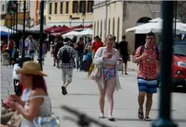  ?? AFP ?? Tourists walk in the tourist hotspot of Rovinj, on the west coast of the Istrian peninsula, on June 11, 2022. Tourists are flocking back to Croatia after the pandemic decimated its vital travel industry, except the Adriatic nation has a problem: it lacks workers to cater to the legions of visitors, and is recruiting people in neighborin­g Balkan countries and as far as Asia to fill the gap.