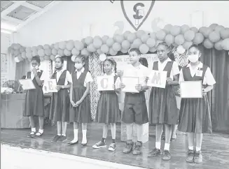  ?? ?? Students doing a welcoming act at the launching of the Literacy and Robotics Programme at the La Retraite Primary School on Wednesday (Ministry of Education photo)