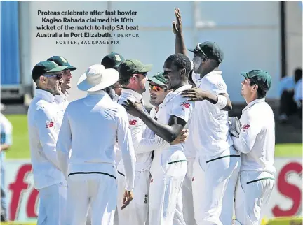  ?? / DERYCK FOSTER/BACKPAGEPI­X ?? Proteas celebrate after fast bowler Kagiso Rabada claimed his 10th wicket of the match to help SA beat Australia in Port Elizabeth.