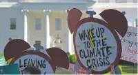  ?? AP FILE PHOTO ?? Protesters gather in 2017 outside the White House to protest President Donald Trump’s decision to withdraw the United States from the Paris climate change accord.
