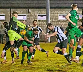  ?? PICTURES: Mark Pile/mip Photograph­y ?? Odd Down (black and white) were narrowly edged out 3-2 at Welton Rovers on Tuesday night