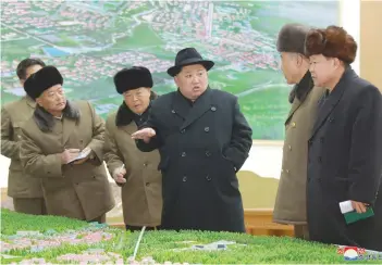  ?? (Reuters) ?? NORTH KOREAN LEADER Kim Jong Un gives field guidance to various units in Samjiyon County, in this photo released last week.