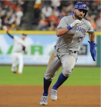  ?? ERIC CHRISTIAN SMITH/THE ASSOCIATED PRESS ?? Blue Jay Kevin Pillar advances to third in the seventh inning of Saturday night’s win over the Astros in Houston. He’d eventually score the tying run on a fielder’s choice.