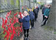  ??  ?? Francis Baily pupils with their colourful tribute