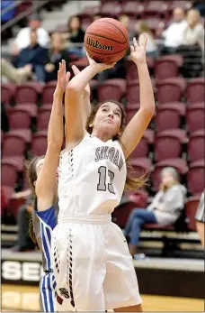  ?? Bud Sullins/Special to the Herald-Leader ?? Siloam Springs junior Brooklyn Buckminste­r looks for her shot against Rogers on Dec. 13. The Lady Panthers open play at 7 p.m. Wednesday against Coweta, Okla., in the Siloam Springs Holiday Classic.