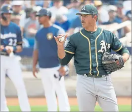  ?? MATT YORK — ASSOCIATED PRESS ?? A’s starter Daniel Mengden took a shutout into the sixth inning against the Brewers on Wednesday before Bay Area native Eric Thames hit a two-run homer.
