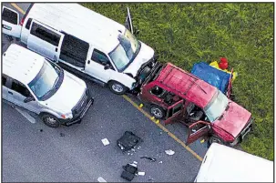  ?? AP/Austin American-Statesman/JAY JANNER ?? The vehicle Mark Anthony Conditt was driving sits on the side of a highway Wednesday in Round Rock, Texas, after one of his own bombs exploded inside as police approached.