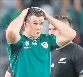  ??  ?? Ireland’s Johnny Sexton looks dejected after loss to New Zealand.