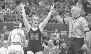  ?? ?? Marysville's Cali Leng improved on last year's runner-up finish by winning the 120-pound title in the first OHSAA girls wrestling state tournament.