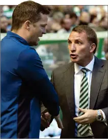  ??  ?? HARD FEELINGS: Daly and Rodgers shake hands at full-time