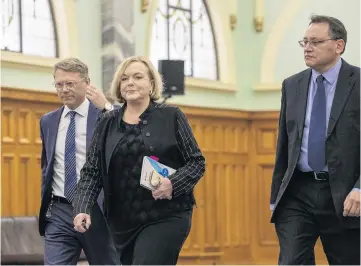  ?? PHOTO: THE NEW ZEALAND HERALD ?? National Party leader Judith Collins is flanked by Paul Goldsmith (left) and Dr Shane Reti in Parliament last year.