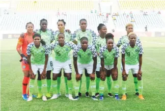  ??  ?? Line-up of the Super Falcons before their opening match of group B against the Bayana Bayana of South Africa. The Falcons face Zambia today in their second group match.