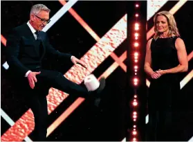  ?? BBC ?? Still got it: Lineker juggles a toilet roll as Logan watches on