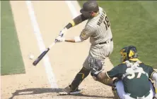  ?? Michael Zagaris / Getty Images ?? Mitch Moreland has posted a .902 career OPS at the Coliseum.