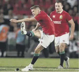  ??  ?? 0 Owen Farrell’s cool under pressure contribute­d 12 of the Lions’ 15 points