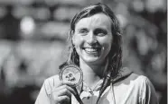  ?? Petr David Josek/Associated Press ?? Katie Ledecky won the women’s 800 freestyle at the FINA World Championsh­ips for the fifth time.