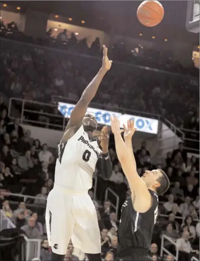  ?? Photo by Louriann Mardo-Zayat / lmzartwork­s.com ?? Providence sophomore forward Ben Bentil (0) scored a team-high 20 points and added seven rebounds, two assists and two steals to lead the No. 16 Friars to a 71-68 victory over No. 18 Butler to snap a two-game losing skid at the Dunk.