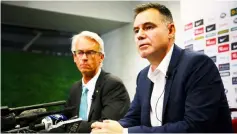  ??  ?? David Gallop (left) and Ante Milicic attend a press conference at Suncorp Stadium in Brisbane. — AFP photo