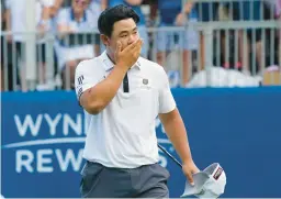  ?? CHUCK BURTON/AP ?? Joohyung Kim reacts after winning the Wyndham Championsh­ip on Sunday in Greensboro, North Carolina. Kim shot a final-round 9-under 61 for the five-shot victory.