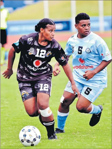  ?? Picture: RAMA ?? Sainiana Niubalavu of Ba (left) looks for support againjst Tailevu-Naitasiri during the Vodafone Women’s IDC 2020 at the ANZ Stadium.