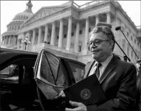  ?? ASSOCIATED PRESS ?? SEN. AL FRANKEN, D-MINN., LEAVES the Capitol after speaking on the Senate floor Thursday on Capitol Hill in Washington. Franken said he will resign from the Senate in coming weeks following a wave of sexual misconduct allegation­s and waning support...