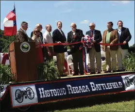  ?? STEVE BARFIELD / Special for the Calhoun Times ?? Local and state representa­tives participat­e in the ribbon cutting ceremony of the Resaca Battlefiel­d Historic Site on Friday, May 13. For more photos from the event, see page 2B.