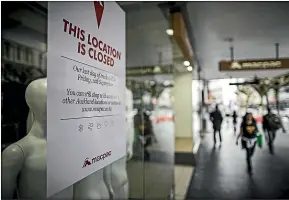  ?? ?? Dozens of shops are empty on Auckland’s Queen St.