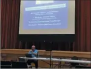  ?? LAURA CATALANO — FOR DIGITAL FIRST MEDIA ?? Joseph Kirschner, the consultant who conducted the regional police force study, reviews the results with residents during a public hearing.