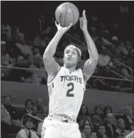  ?? AP/TODD J. VAN EMST ?? Auburn sophomore guard Bryce Brown, who is the only player in the Tigers’ starting lineup who isn’t a freshman, hit 9 three-pointers and finished with 27 points in the team’s 90-86 victory over the Arkansas Razorbacks last season in Fayettevil­le.