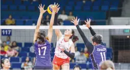  ?? ?? CHERY TIGGO'S Eya Laure goes for a spike against two SGA defenders. (PVL Images)