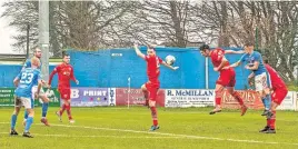  ?? ?? Under pressure Jack Leitch heads away a Stranraer cross