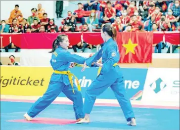  ?? SUPPLIED ?? Pal Chhor Raksmey (left) in action during the 31st SEA Games in Vietnam in May.