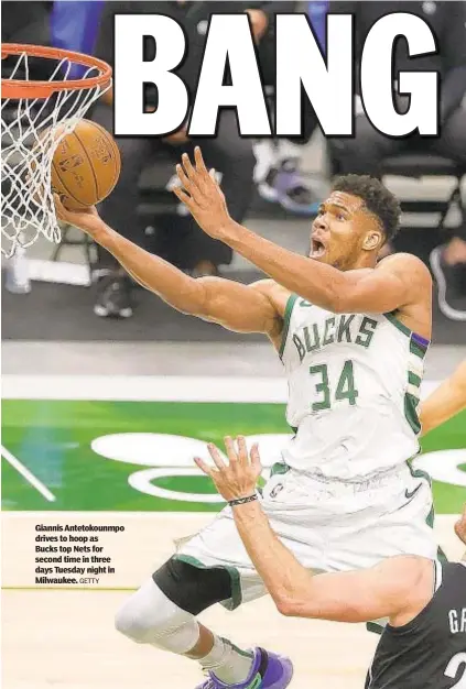  ?? GETTY ?? Giannis Antetokoun­mpo drives to hoop as Bucks top Nets for second time in three days Tuesday night in Milwaukee.