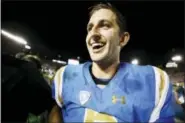  ?? DANNY MOLOSHOK — THE ASSOCIATED PRESS ?? UCLA quarterbac­k Josh Rosen leaves the field after defeating Texas A&M in an NCAA college football game Sunday in Pasadena, Calif. UCLA won 45-44.
