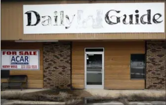  ?? ORLIN WAGNER ?? In this Feb. 19, 2019photo, the old Daily Guide office stands for sale in St. Robert, Mo. With the shutdown of the newspaper in September 2018, this area in central Missouri’s Ozark hills joined more than 1,400other cities across the United States to lose a newspaper over the past 15years, according to an Associated Press analysis of data compiled by the University North Carolina.